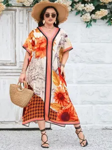 Boho resort style V-neck loose long dress featuring vibrant sunflower and geometric prints.