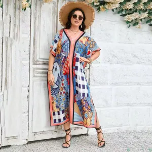 Boho ethnic print long dress detail, loose vacation wear, comfortable summer maxi kaftan style.