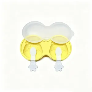 Silicone ice cream mold for DIY homemade popsicles with cartoon lid and two cute sticks.