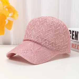 Pink mesh baseball cap for women, breathable summer sun protection hat with hollow woven design.