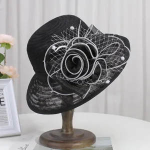 Elegant black women sun hat with white mesh flower, breathable lace sunhat for summer beach travel.