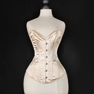 Satin boned corset top with front busk closure, elegant beige waist cincher shapewear.