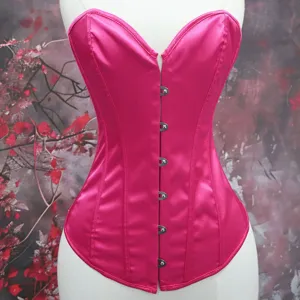 Close up of hot pink satin corset with metal front busk, sweetheart neckline and boning.