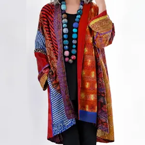 Bohemian patchwork long cardigan detail view, vintage ethnic print open front coat style.
