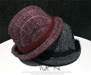 Detailed view of women's autumn winter wool blend rolled brim retro British bucket hat.