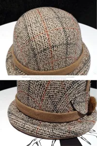 Detail shot of retro tweed plaid cloche hat, winter warm bucket hat with suede band.