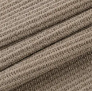 Gerippter Stoffdetail von Damen Sport Leggings Nahaufnahme Strick Textur weich khaki