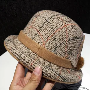 Vintage plaid dome cloche hat with brown band and side pom-pom for autumn and winter.