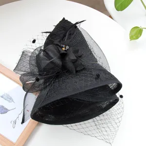 Vintage black mesh fascinator hat with floral feather accents for women tea party.