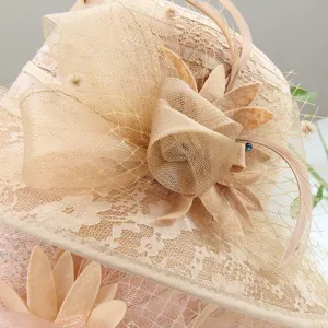 Detailed view of vintage women mesh lace sun hat with elegant fabric flower and feather decor.