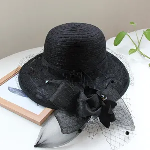 Detailed view of black vintage mesh flower cloche hat, elegant feminine accessory design.