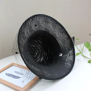 Detailed view of the black vintage mesh bucket hat, showing texture and elegant veil decoration.