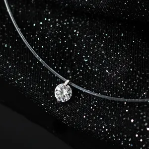 Detailed shot of a sparkling solitaire moissanite invisible thread necklace, elegant silver.