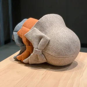 Stylish knitted bucket hat for women autumn winter wool warm fisherman hat with cute bow design.