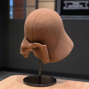 Brown knitted bucket hat with stylish back bow detail for women autumn winter warm