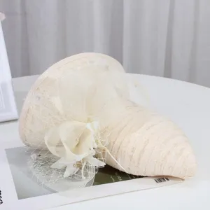 Elegant beige lace sun hat with delicate mesh bow for women summer outdoor travel.