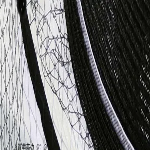 Close up view of black mesh fascinator hat detail, elegant summer women hat texture.