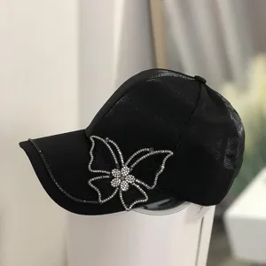 Schwarze Damen Kappe mit Strass Schmetterling Detail, stilvoller Sommer Sonnenhut.
