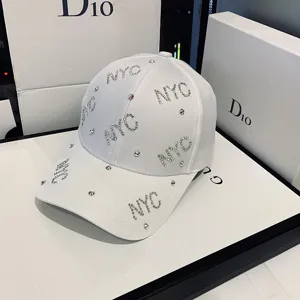 White rhinestone NYC baseball cap for women, casual sun hat with dazzling diamond crystals.