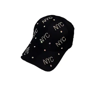 Black rhinestone NYC baseball cap for women, stylish adjustable sun protection summer hat.