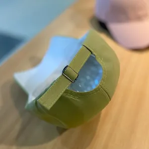 Casual green baseball cap for daily wear, adjustable metal buckle strap, sun protection summer hat.
