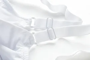Detailed view of white bra straps and adjustable sliders for comfort and daily wear.