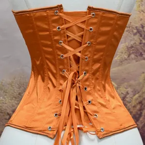 Orange satin lace up corset top detail view, featuring metal eyelets and structured boning.