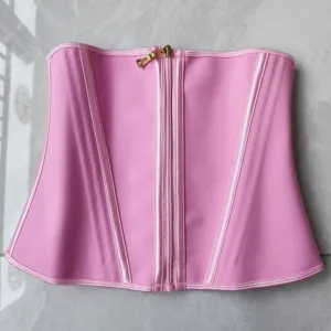 Pink latex waist trainer corset with front zipper and spiral steel bones for body shaping.
