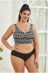 Plus size sports bra and panties set featuring bold letter print design for comfortable workout.