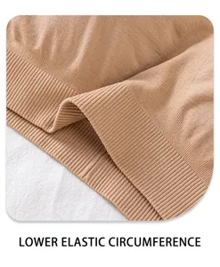 Close-up view of the lower elastic circumference on a seamless strapless bra and tube top.