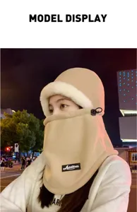 Winter fleece cycling face mask and integrated hat detail view showing thick windproof material.
