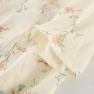 Fine pure cotton gauze sleeprobe fabric detail, soft floral print kimono cuff closeup.