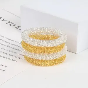 Bague de massage acupression ressort en metal, jouet de decompression dore et argente poignet.