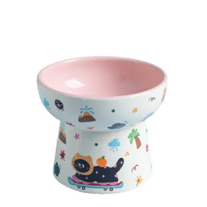 Elevated ceramic cat bowl with cute cartoon design, pink and white pet food water bowl.