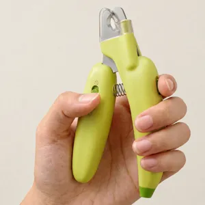 Ergonomic banana shaped pet nail clipper with stainless steel blade and spring return.