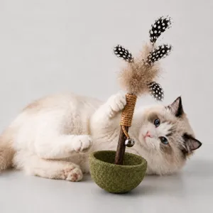 Interactive cat toy teaser wand with feathers and sisal base for indoor kittens and pets play.