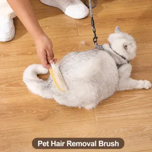 Pet grooming brush for cats and dogs, effective loose undercoat removal tool for shedding pets.