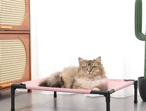 Elevated pet cot for cats and small dogs, breathable mesh cooling bed with durable metal frame.