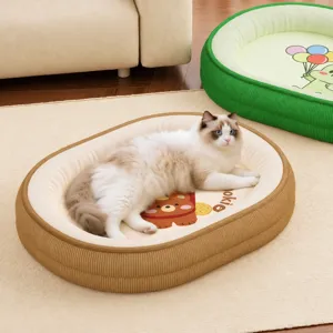 Cozy oval pet bed with soft cushion and cute bear print, warm for cats and small dogs.