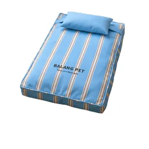 Blue striped pet bed with small pillow, comfortable cotton fabric for cats and dogs.