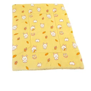 Soft flannel pet blanket with cute rabbit print, warm cat sleeping mat for winter cozy rest.