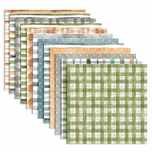 Vista dettagliata di carta decorativa per scrapbooking con righe e pois nei toni della terra.