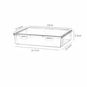 Scatola di conservazione in plastica trasparente con coperchio, capacità 1.25L e precise misure.