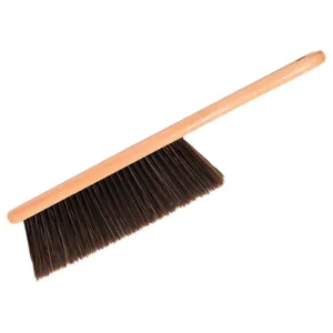 Wooden bed brush with soft bristles and solid wood handle for efficient household daily cleaning.