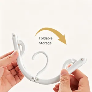 Opvouwbare reisklerenhanger, draagbaar lichtgewicht plastic droogrek voor hotel en reis.