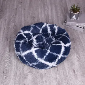 Cozy plush round pet bed for dogs and cats, warm fluffy long hair sleeping mat for all seasons.