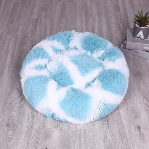 Cozy round plush pet bed for cats and dogs, warm long-hair sleeping nest, blue and white design.