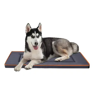 Detailed view of the square oxford cloth pet dog bed with orange trim and a husky model.