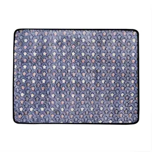 Star pattern pet mat detail shot, soft fabric dog bed cushion closeup, cozy floor mat texture.