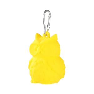 Yellow silicone owl poop bag dispenser detail view with metal carabiner hook for daily pet walking.